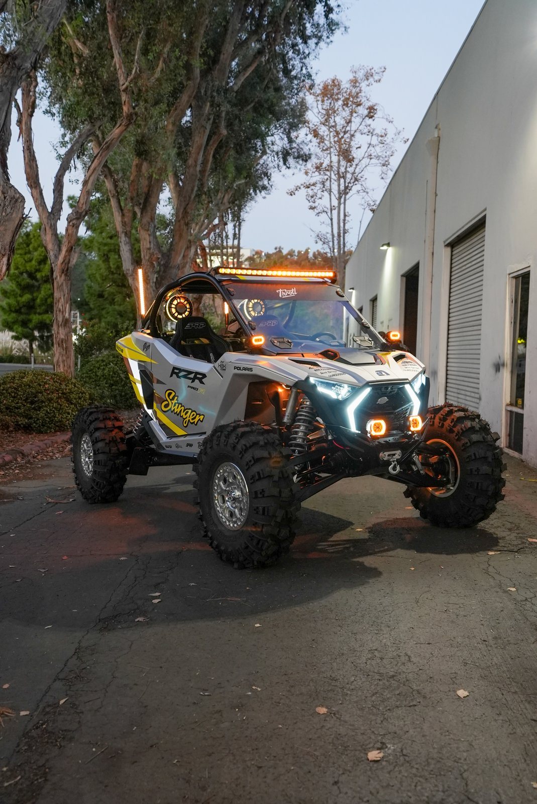 The Stinger x Throtl Polaris RZR Pro R build, featuring the HORIZON XTR MFD, HEXCORE lighting and a UTV Stereo sound system.