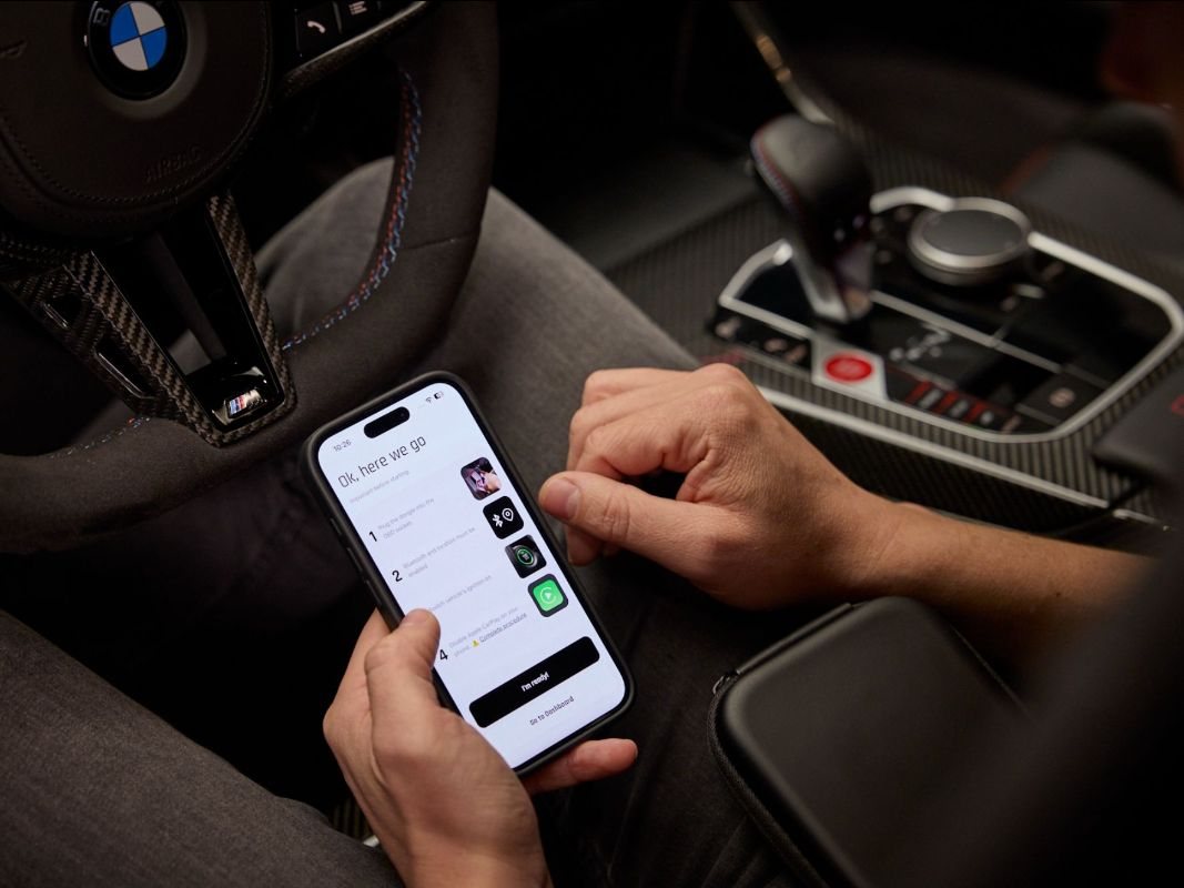 A customer uses the MyFlasher app with the AutoTuner One to install a tune remotely.