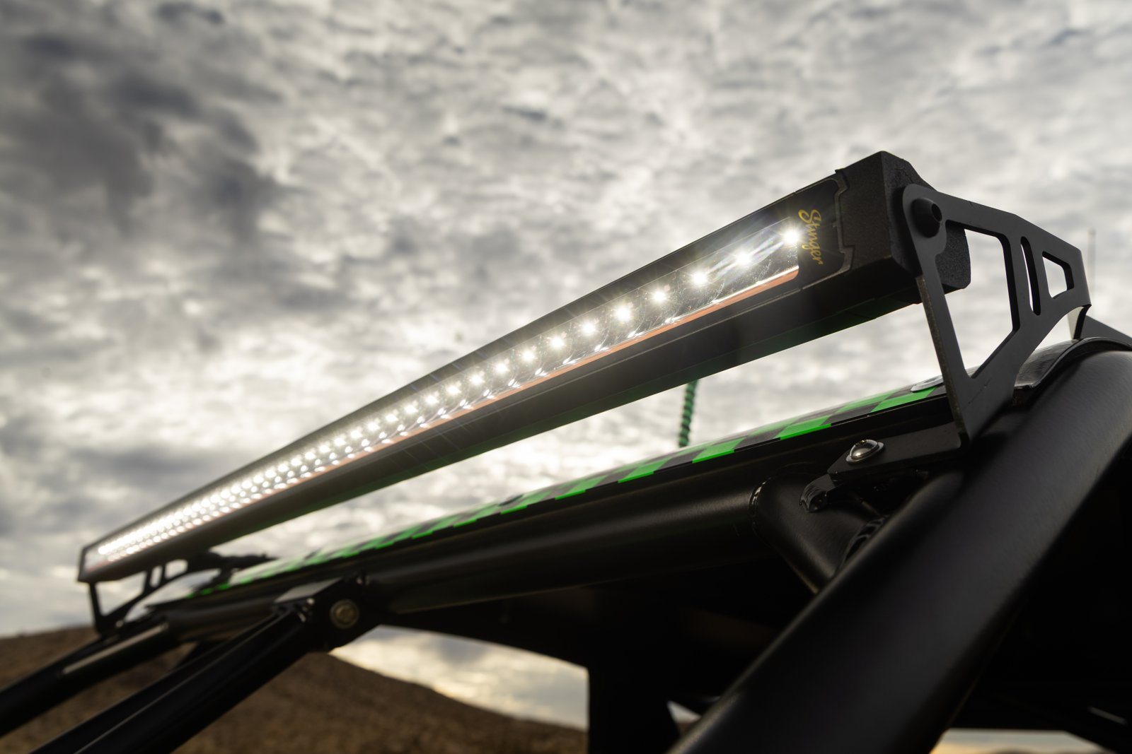 Stinger HEXCORE LED light bar mounted on a UTV roll cage.