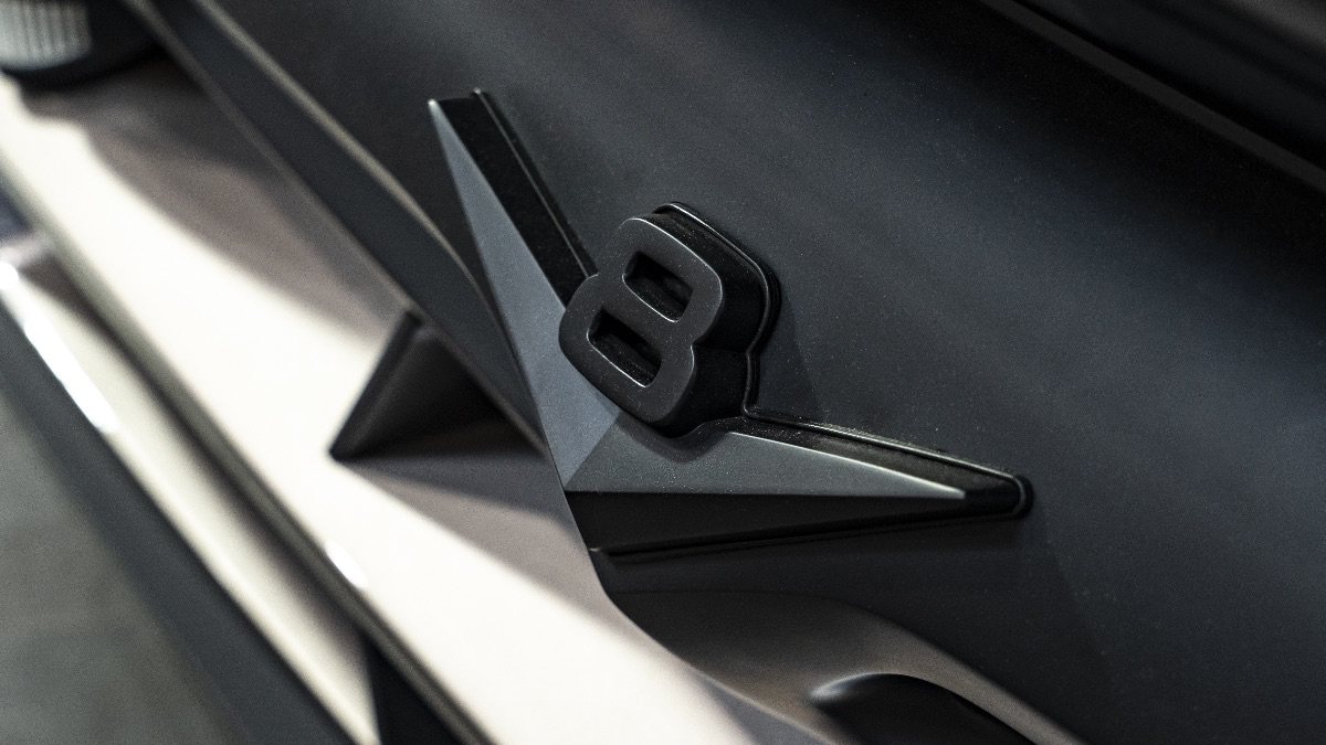 V8 badge detail on the 1956 Ford F-100 GT/FX, Fat Fender Garage’s 800-horsepower Designer Series flagship making its world premiere at SEMA 2026.
