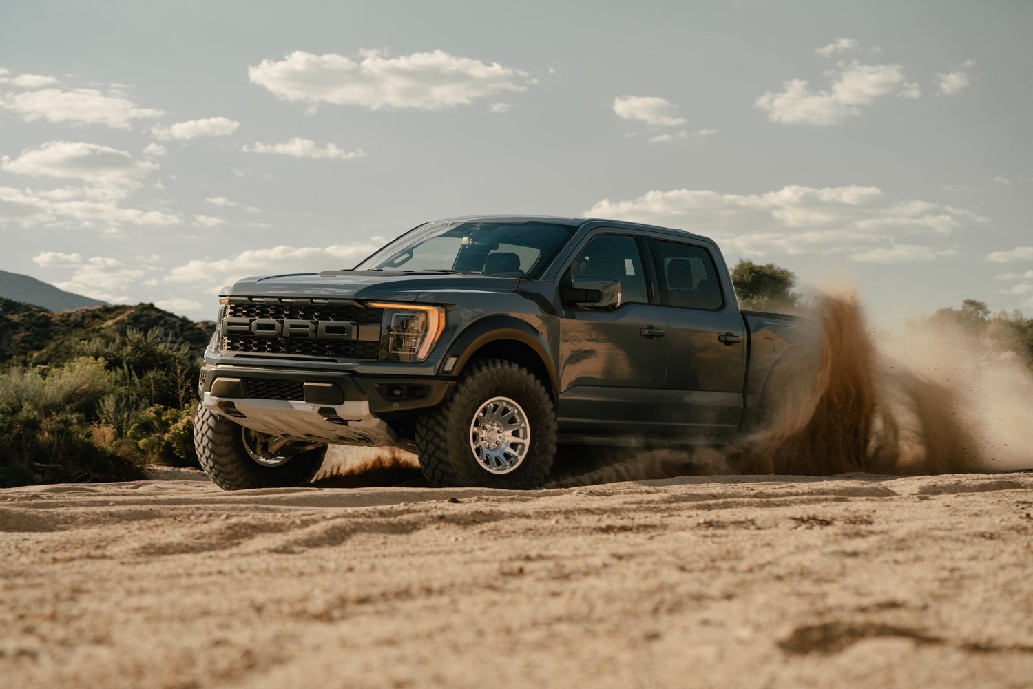 Method Race Wheels 712 Flow Formed Bead Grip on the Ford Raptor, in the dirt